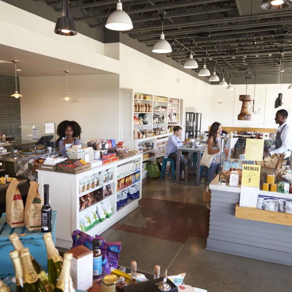 Interior Of Busy Delicatessen With Customers