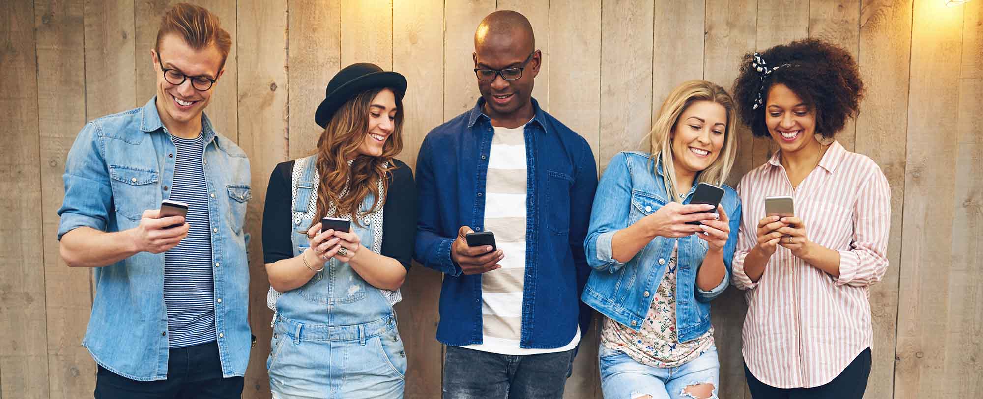 Friends using smartphones